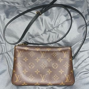 Louis Vuitton cross body bag.